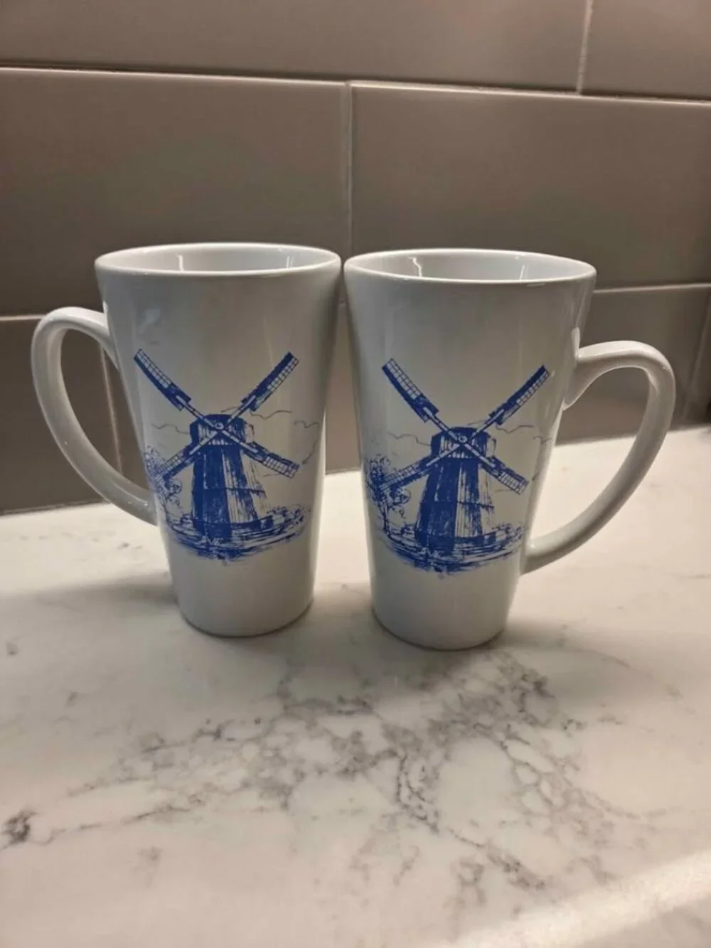 Vintage Pair of 16 oz white ceramic coffee/latte mugs featuring a blue Dutch win